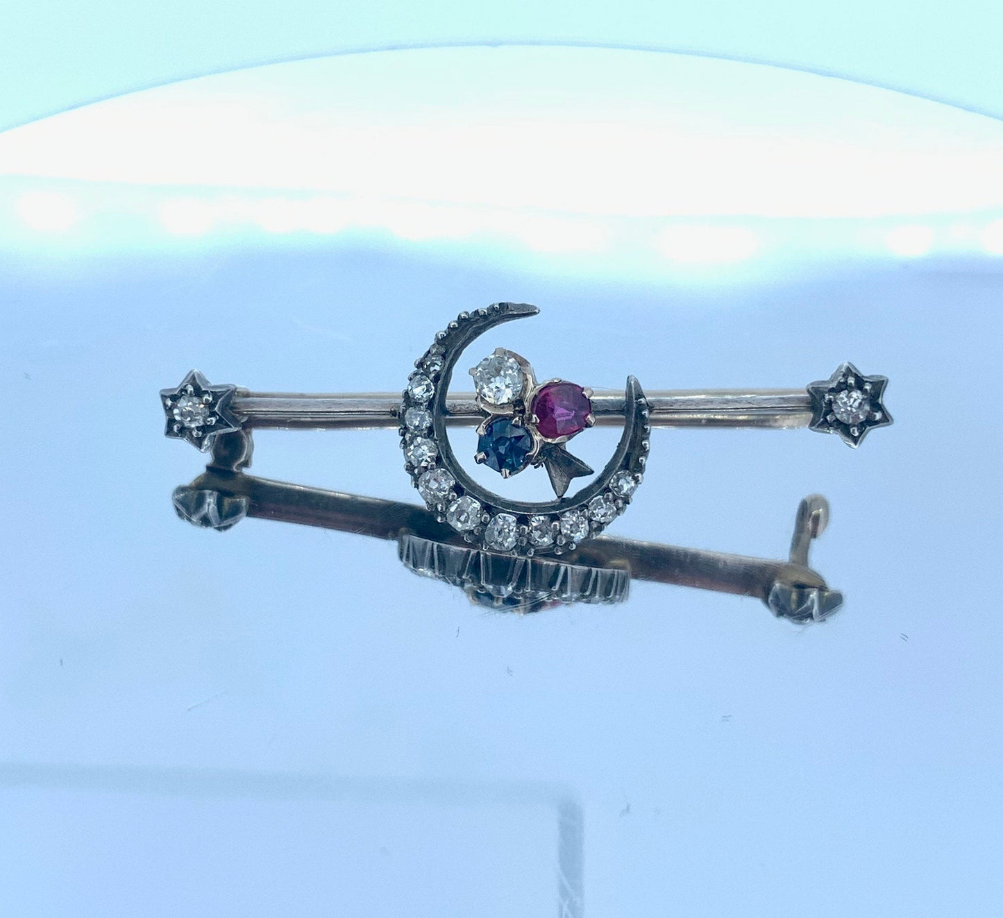 Antique Diamond, Ruby and Sapphire Closed Crescent Moon Brooch. Gold and Silver Set Victorian Brooch. Old European Cut Diamonds.