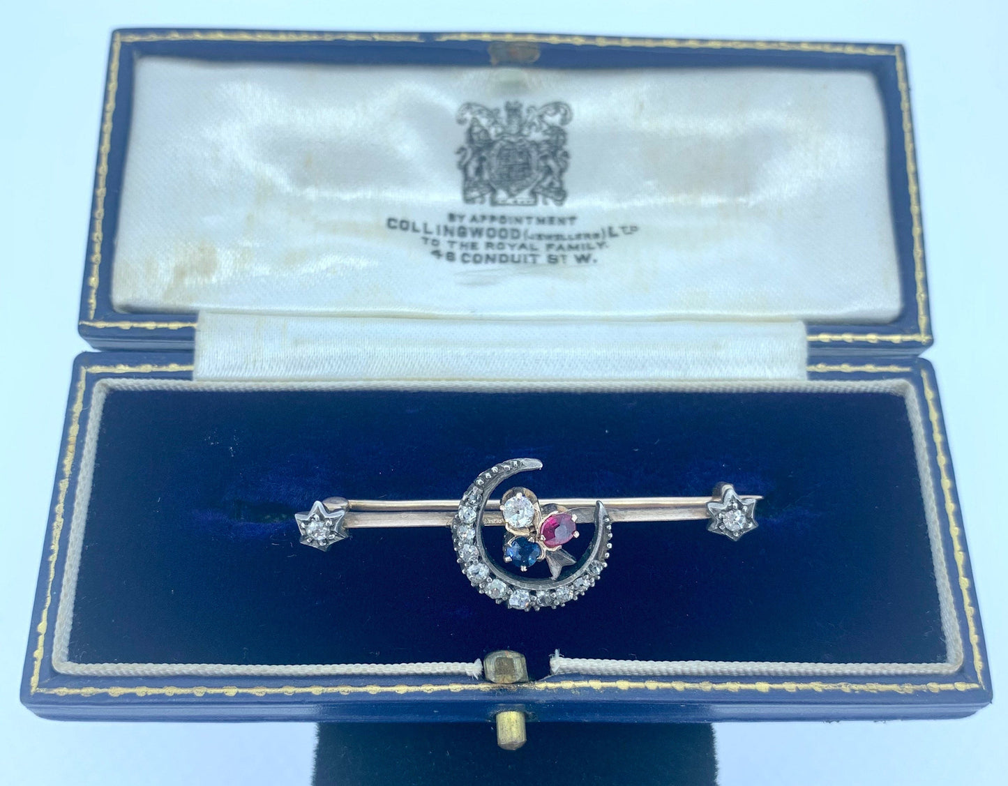 Antique Diamond, Ruby and Sapphire Closed Crescent Moon Brooch. Gold and Silver Set Victorian Brooch. Old European Cut Diamonds.