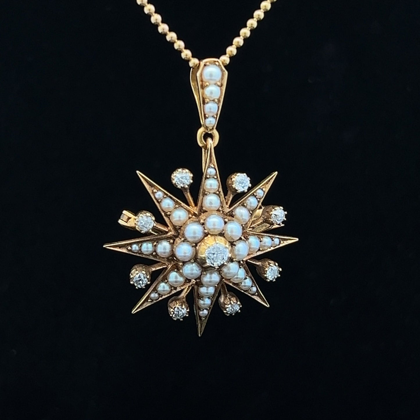 Antique Diamond and Natural Split Pearl High Carat Gold Star Pendant / Brooch in Original Fitted Case. English. Victorian. Circa 1892.