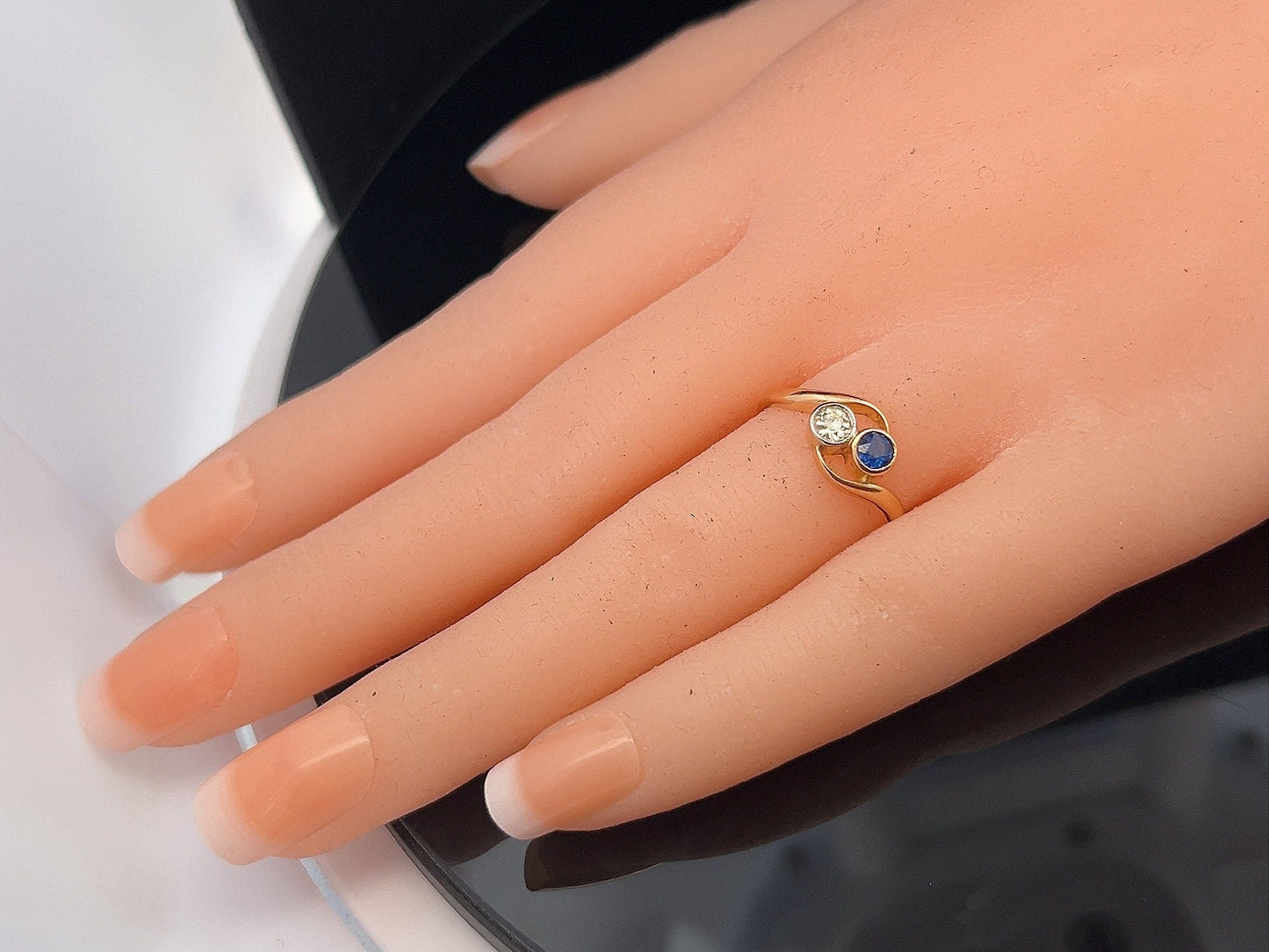 Antique Art Nouveau Sapphire and Diamond 18ct Gold 'Toi et Moi' Crossover Ring. 18ct Gold With Platinum Settings. English Circa 1900/1910.