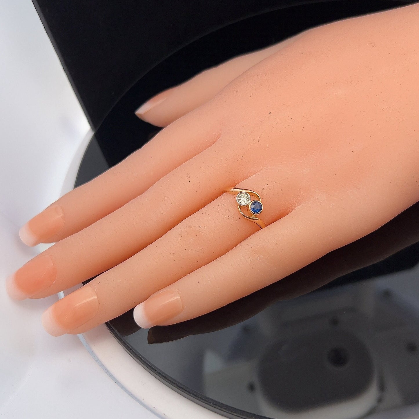 Antique Art Nouveau Sapphire and Diamond 18ct Gold 'Toi et Moi' Crossover Ring. 18ct Gold With Platinum Settings. English Circa 1900/1910.
