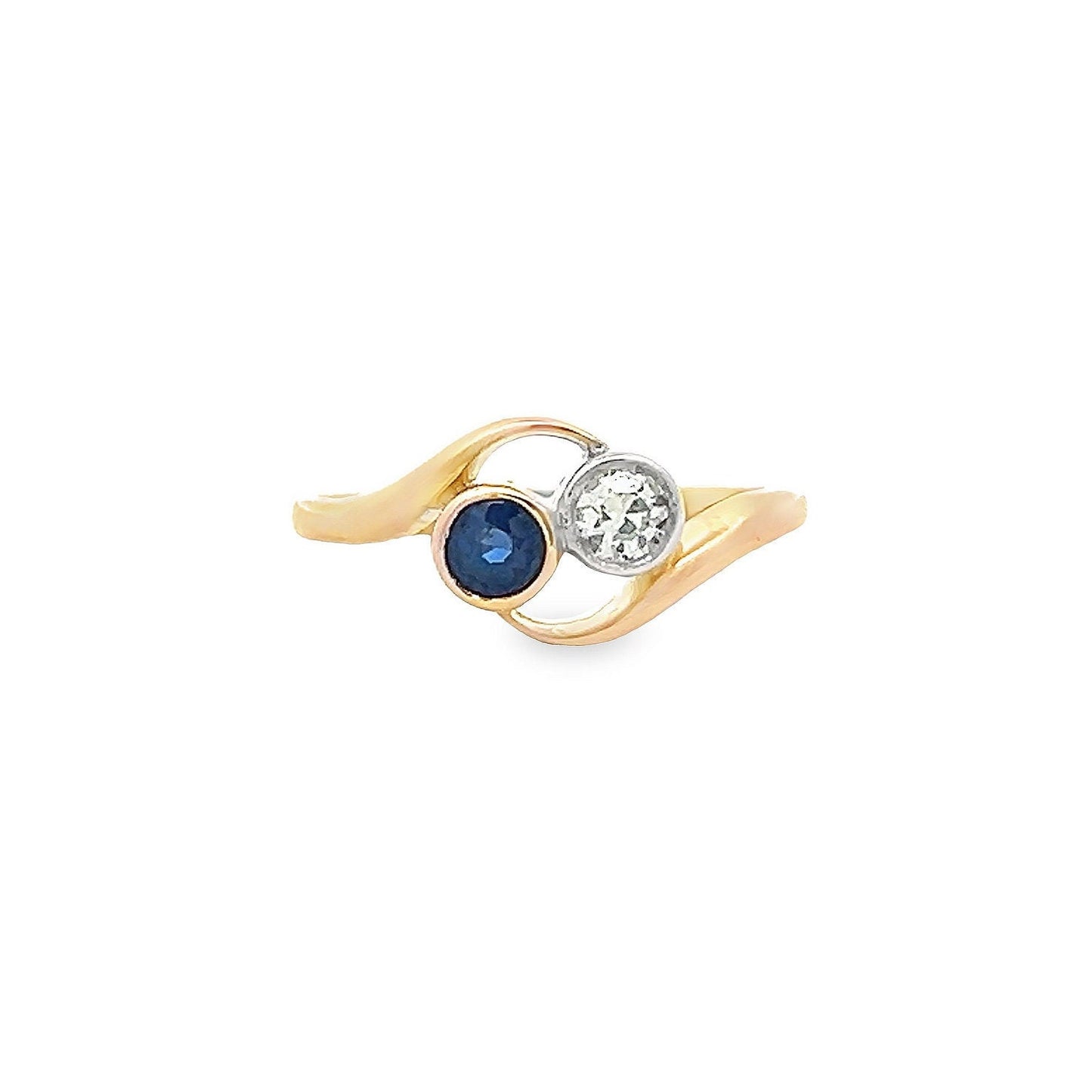 Antique Art Nouveau Sapphire and Diamond 18ct Gold 'Toi et Moi' Crossover Ring. 18ct Gold With Platinum Settings. English Circa 1900/1910.