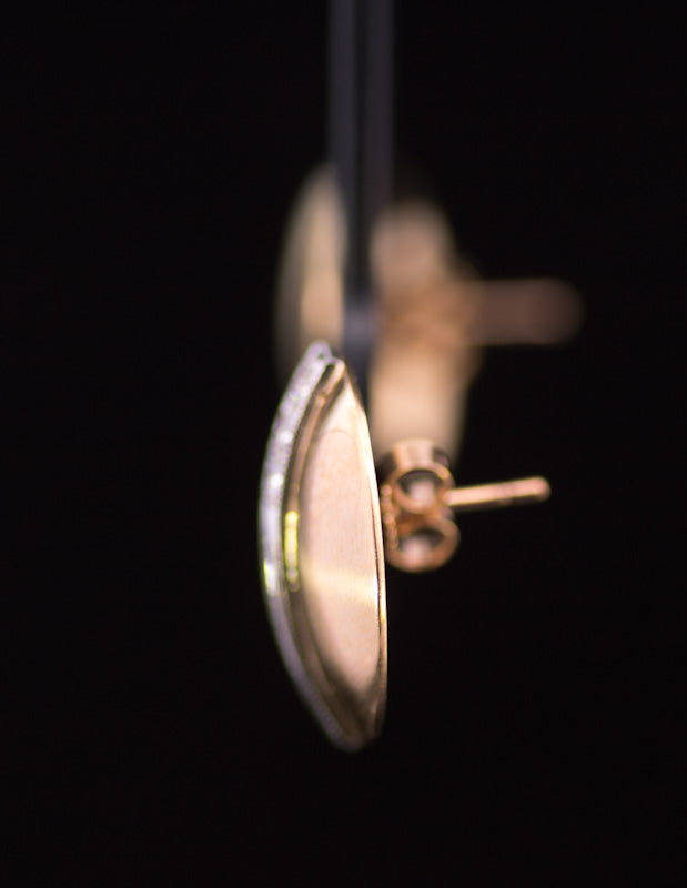 A Striking Pair of Vintage 18ct Gold and Diamond Earrings.