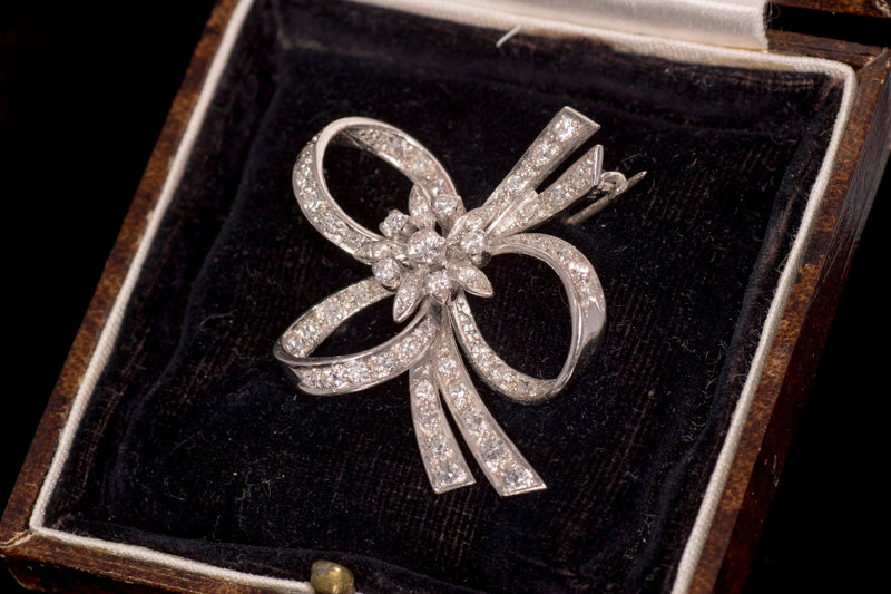 Beautiful Antique 18ct White Gold and Diamond Bow Brooch. English Circa 1948