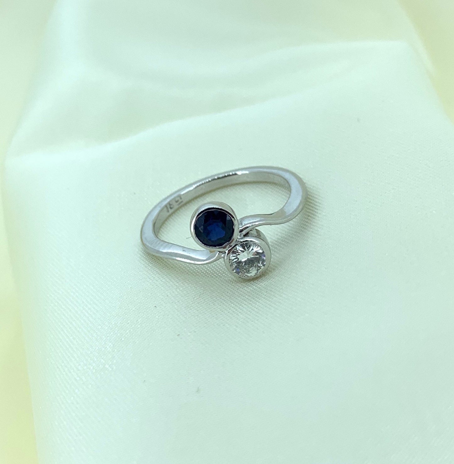 Vintage Diamond and Sapphire Crossover Ring. 18ct White Gold.