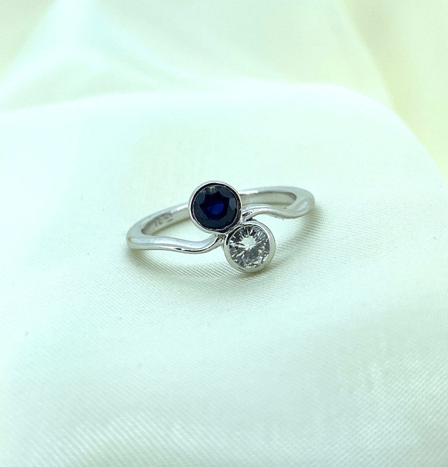 Vintage Diamond and Sapphire Crossover Ring. 18ct White Gold.