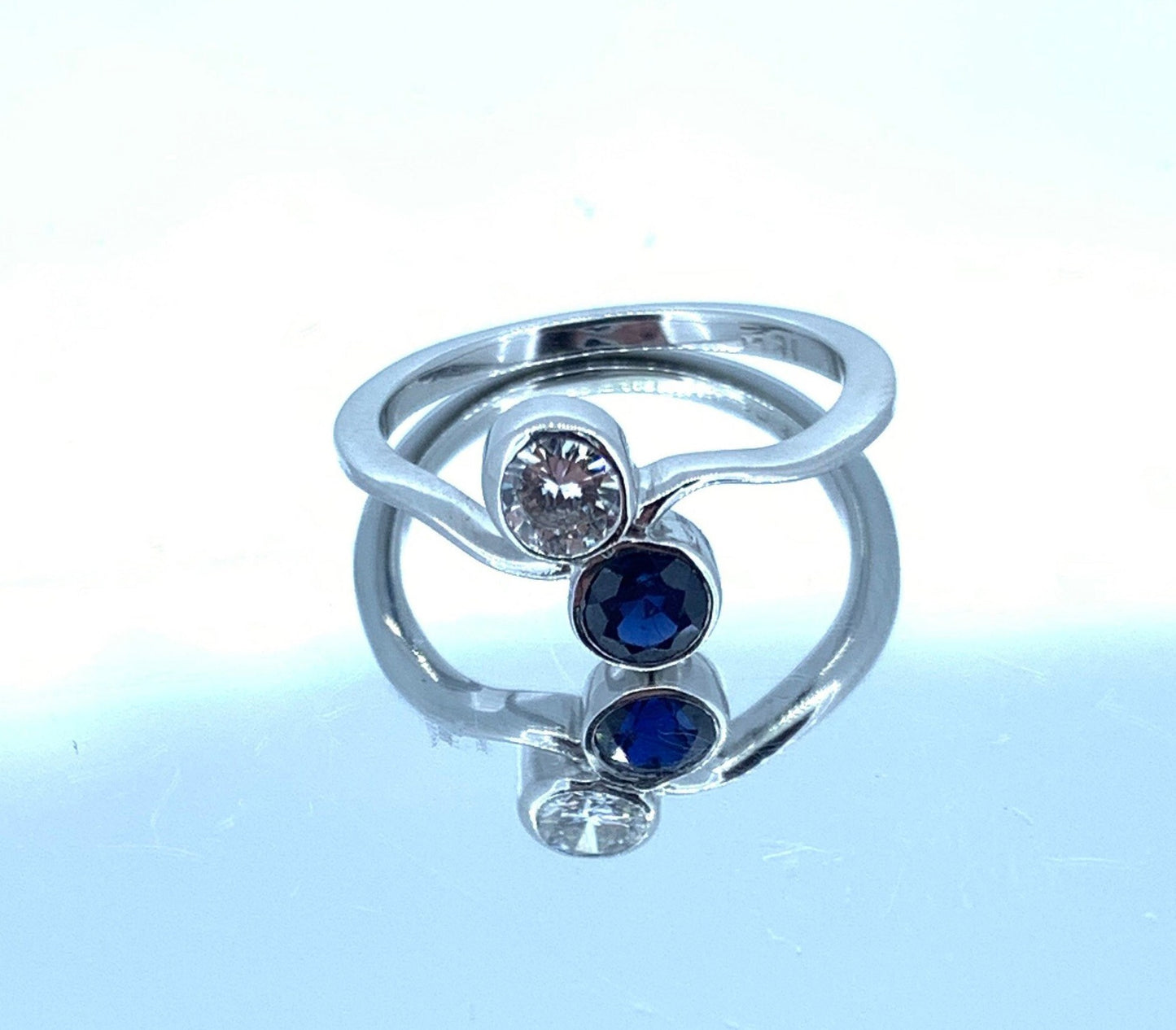 Vintage Diamond and Sapphire Crossover Ring. 18ct White Gold.