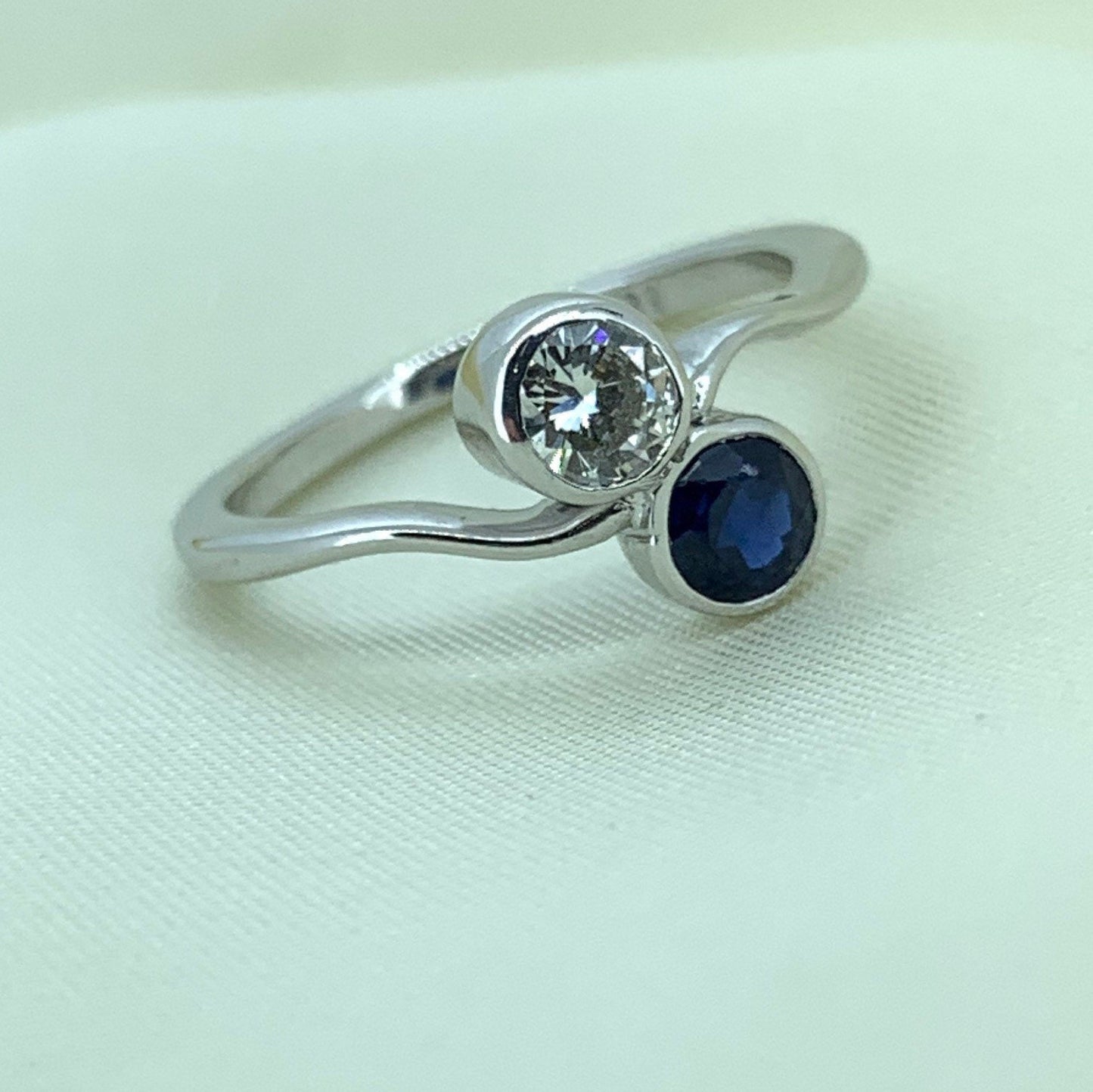 Vintage Diamond and Sapphire Crossover Ring. 18ct White Gold.