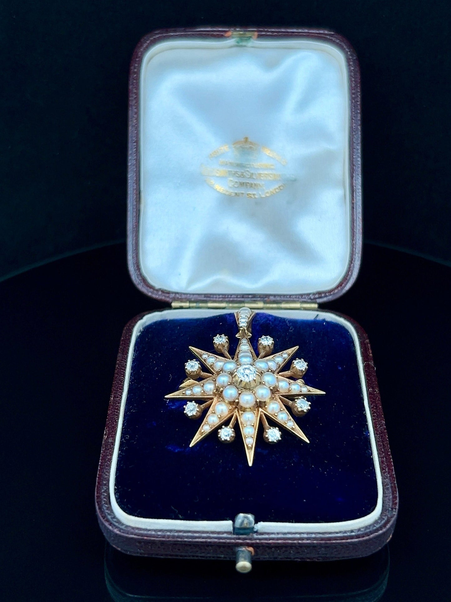 Antique Diamond and Natural Split Pearl High Carat Gold Star Pendant / Brooch in Original Fitted Case. English. Victorian. Circa 1892.