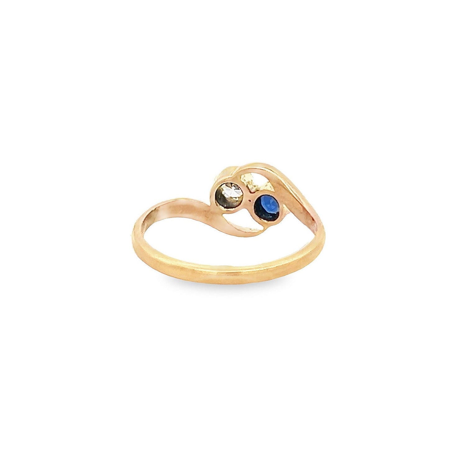 Antique Art Nouveau Sapphire and Diamond 18ct Gold 'Toi et Moi' Crossover Ring. 18ct Gold With Platinum Settings. English Circa 1900/1910.