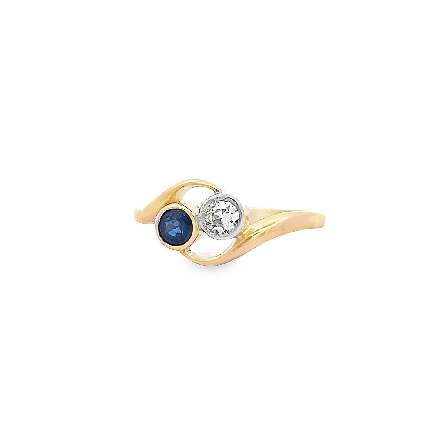 Antique Art Nouveau Sapphire and Diamond 18ct Gold 'Toi et Moi' Crossover Ring. 18ct Gold With Platinum Settings. English Circa 1900/1910.