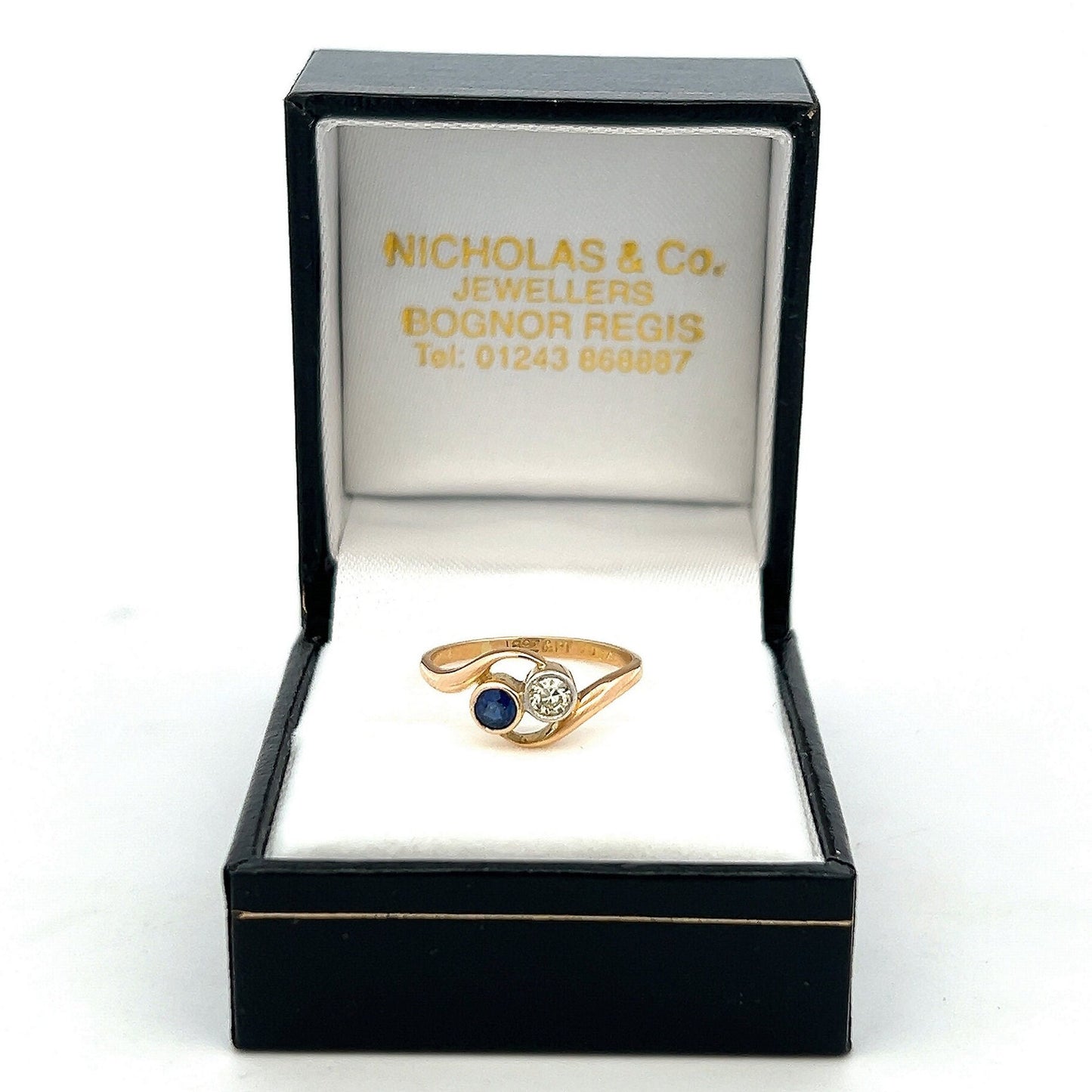 Antique Art Nouveau Sapphire and Diamond 18ct Gold 'Toi et Moi' Crossover Ring. 18ct Gold With Platinum Settings. English Circa 1900/1910.