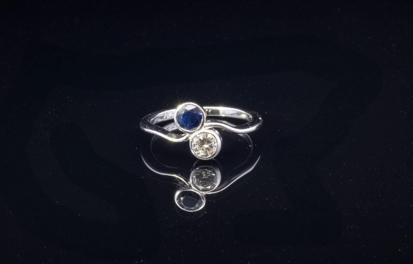 Vintage Diamond and Sapphire Crossover Ring. 18ct White Gold.