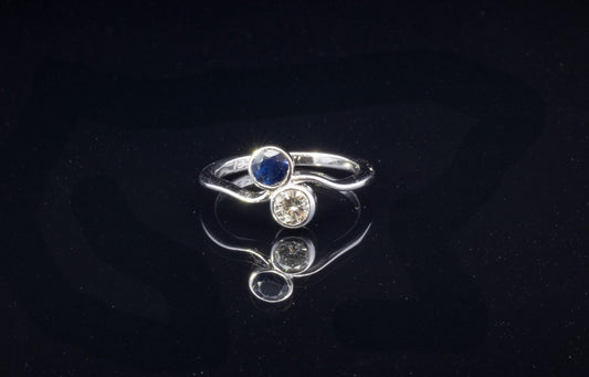 Vintage Diamond and Sapphire Crossover Ring. 18ct White Gold.